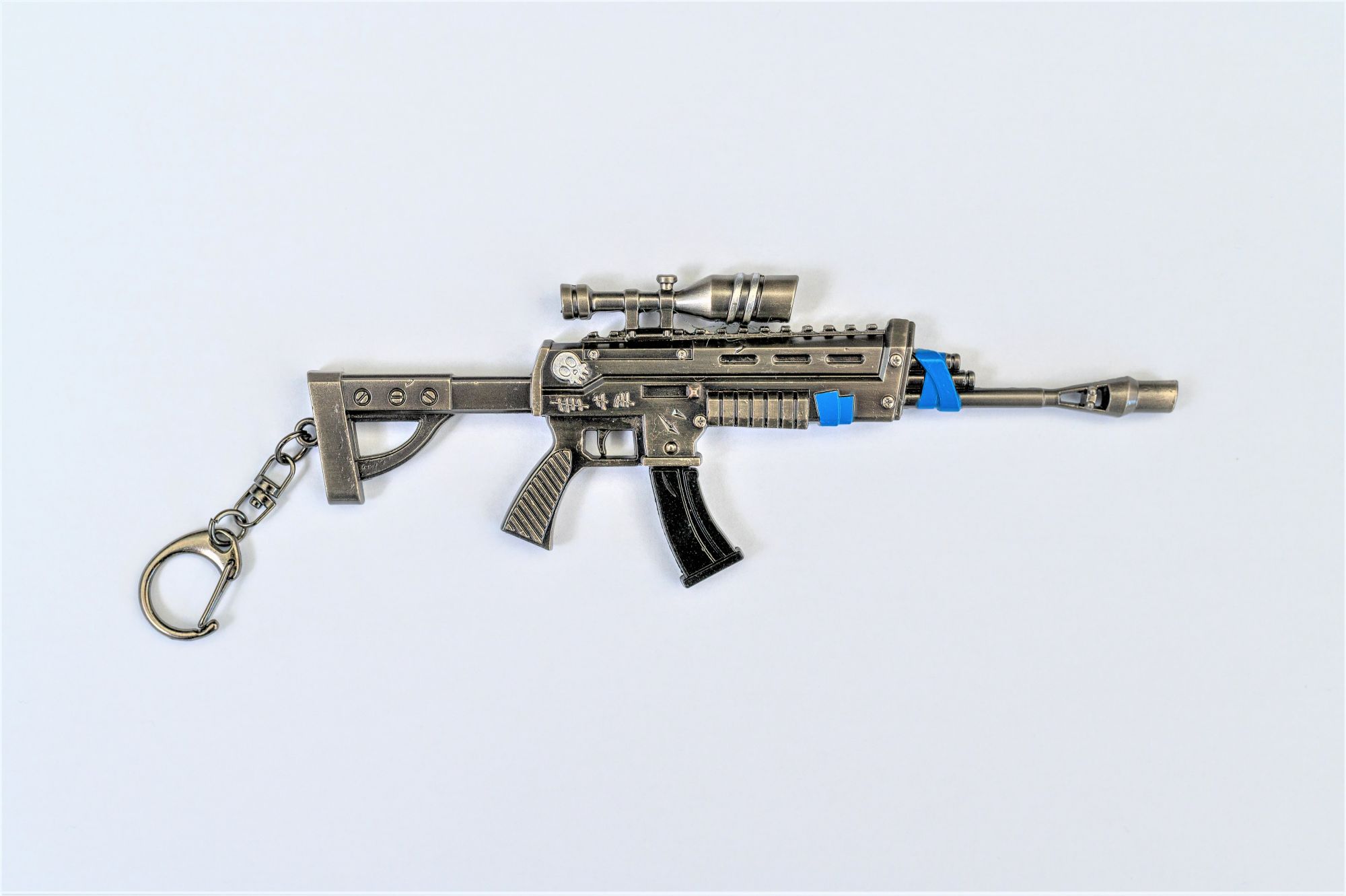 TOY RIFLE 5 comic online games keychain