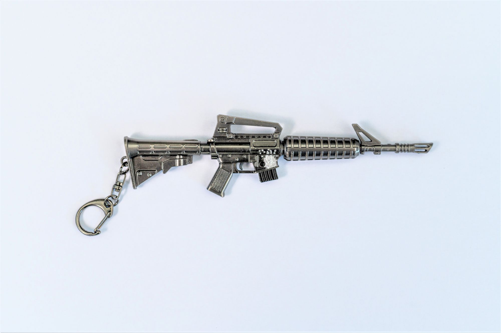 TOY RIFLE 7 comic online games keychain